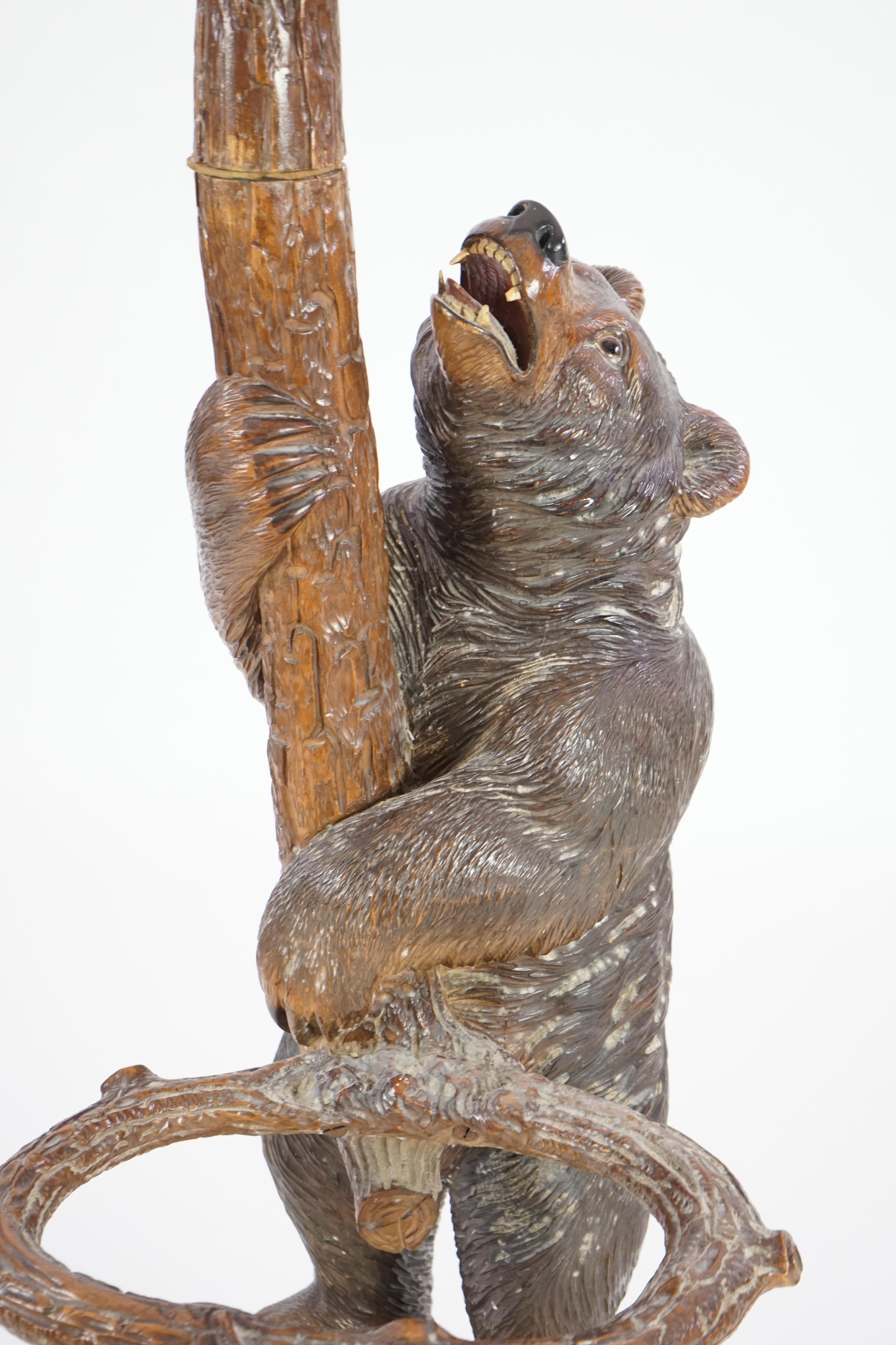 A 19th century Black Forest carved wood bear and cub hall stand